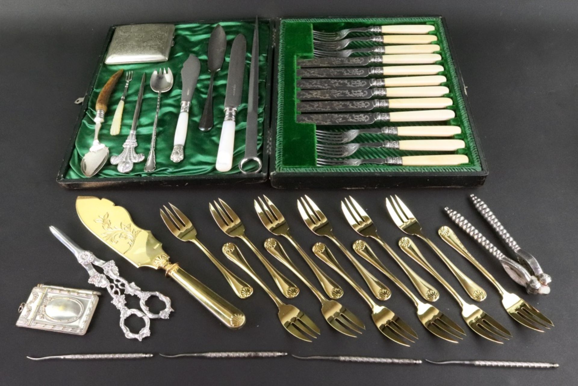 A cased set of six pairs of Victorian bone handled dessert knives and forks, gilt metal fish slice,