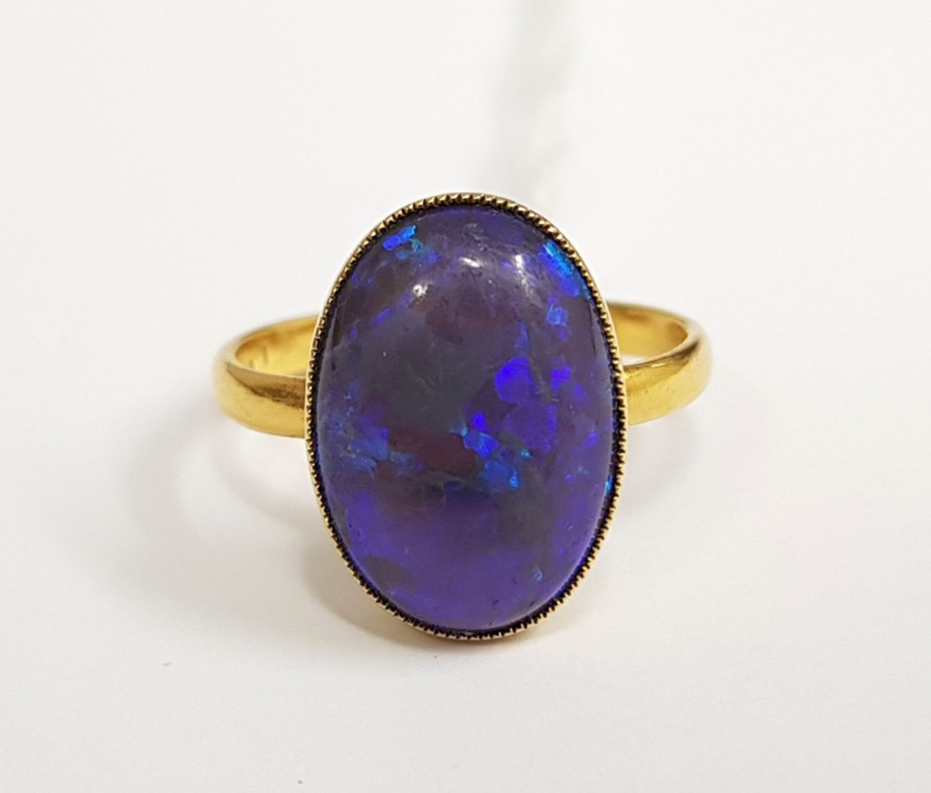 A late Victorian gold and black opal single stone ring, the oval cabochon approx. - Image 2 of 4