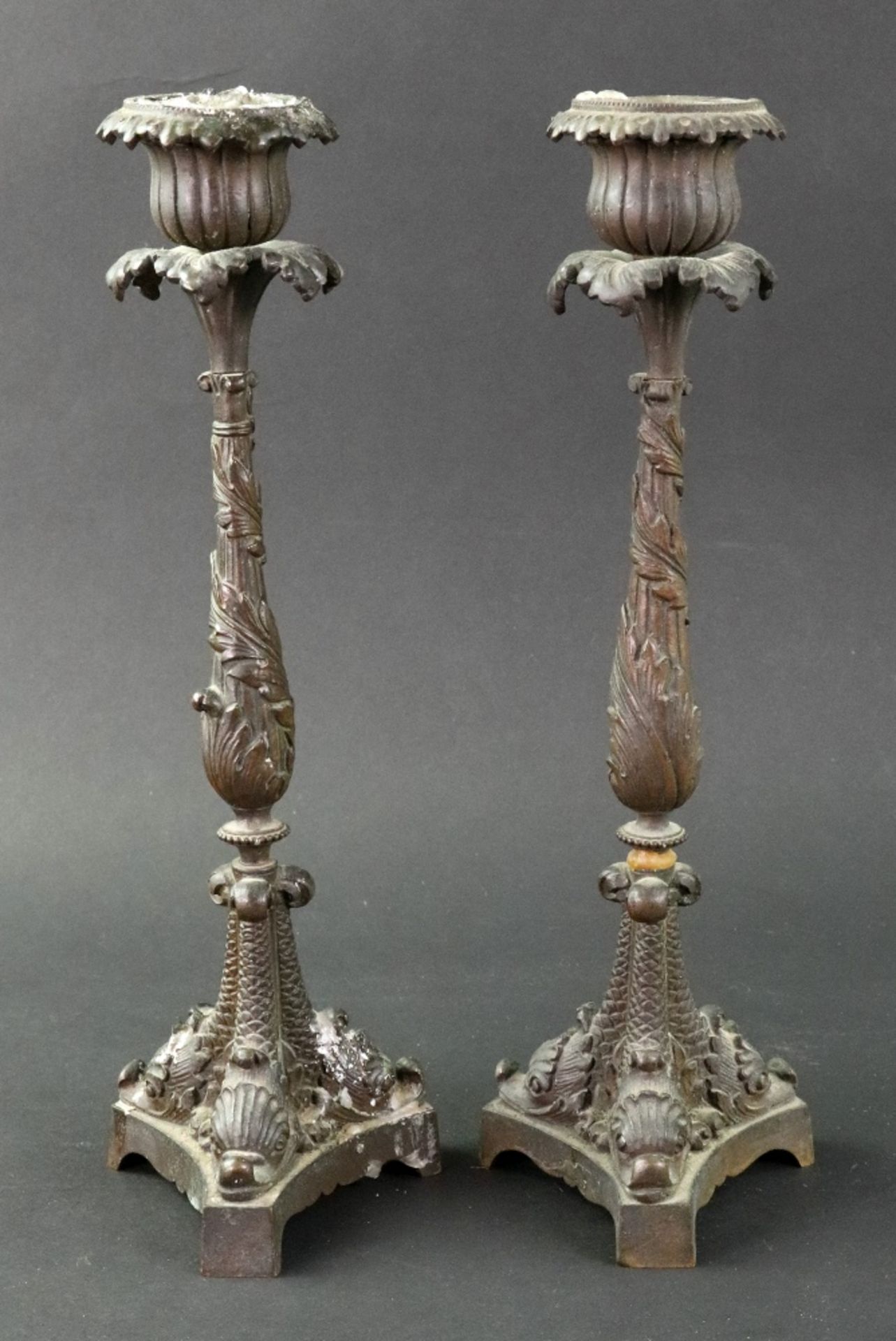 A pair of Regency style bronze candlesticks, 19th century,