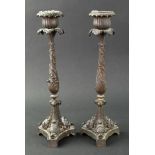 A pair of Regency style bronze candlesticks, 19th century,