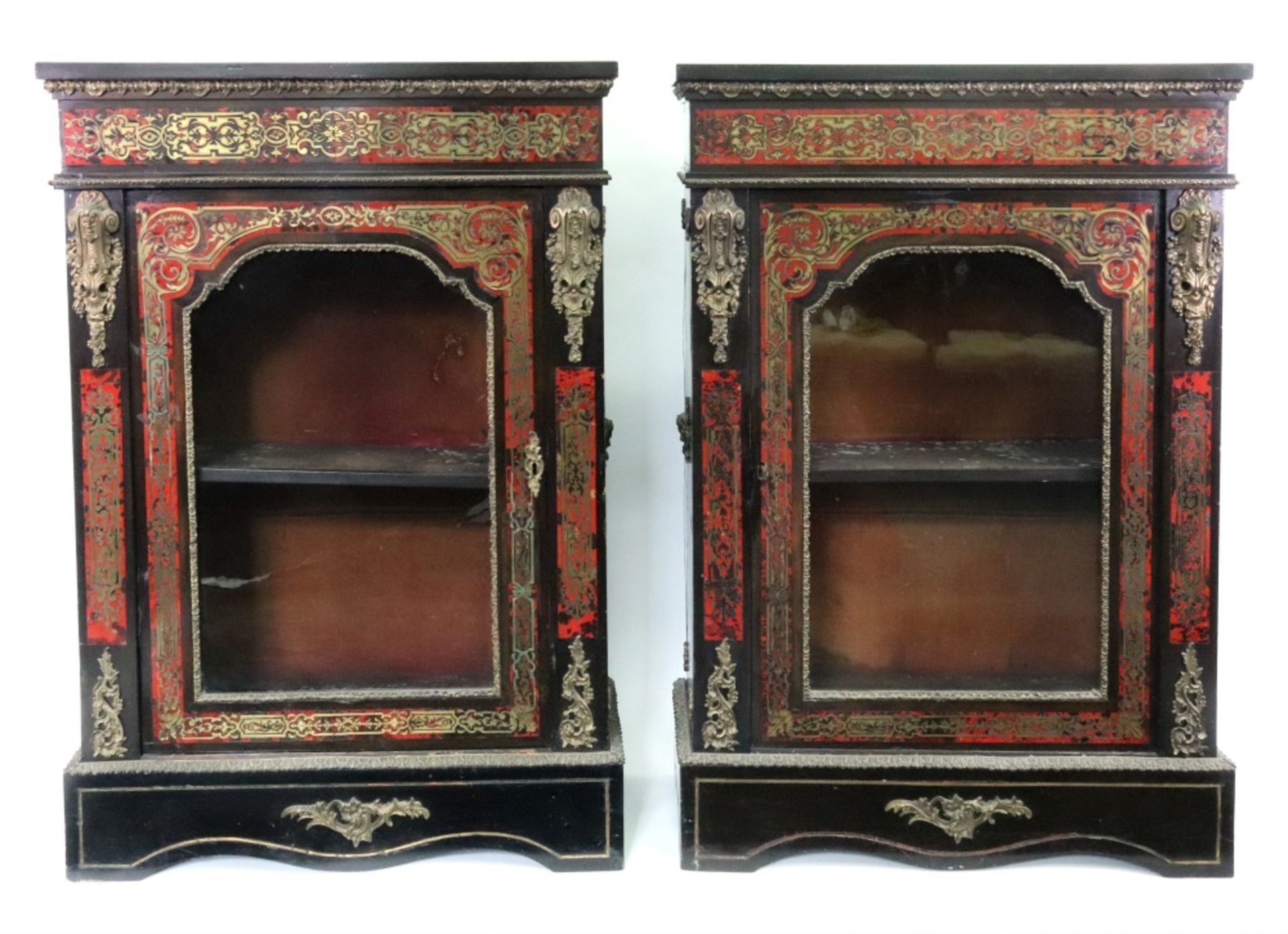 A pair of Napoleon III gilt metal mounted ebonised scarlet tortoiseshell veneered cut-brass