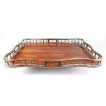 A George III style mahogany tray, 19th century, of serpentine outline,