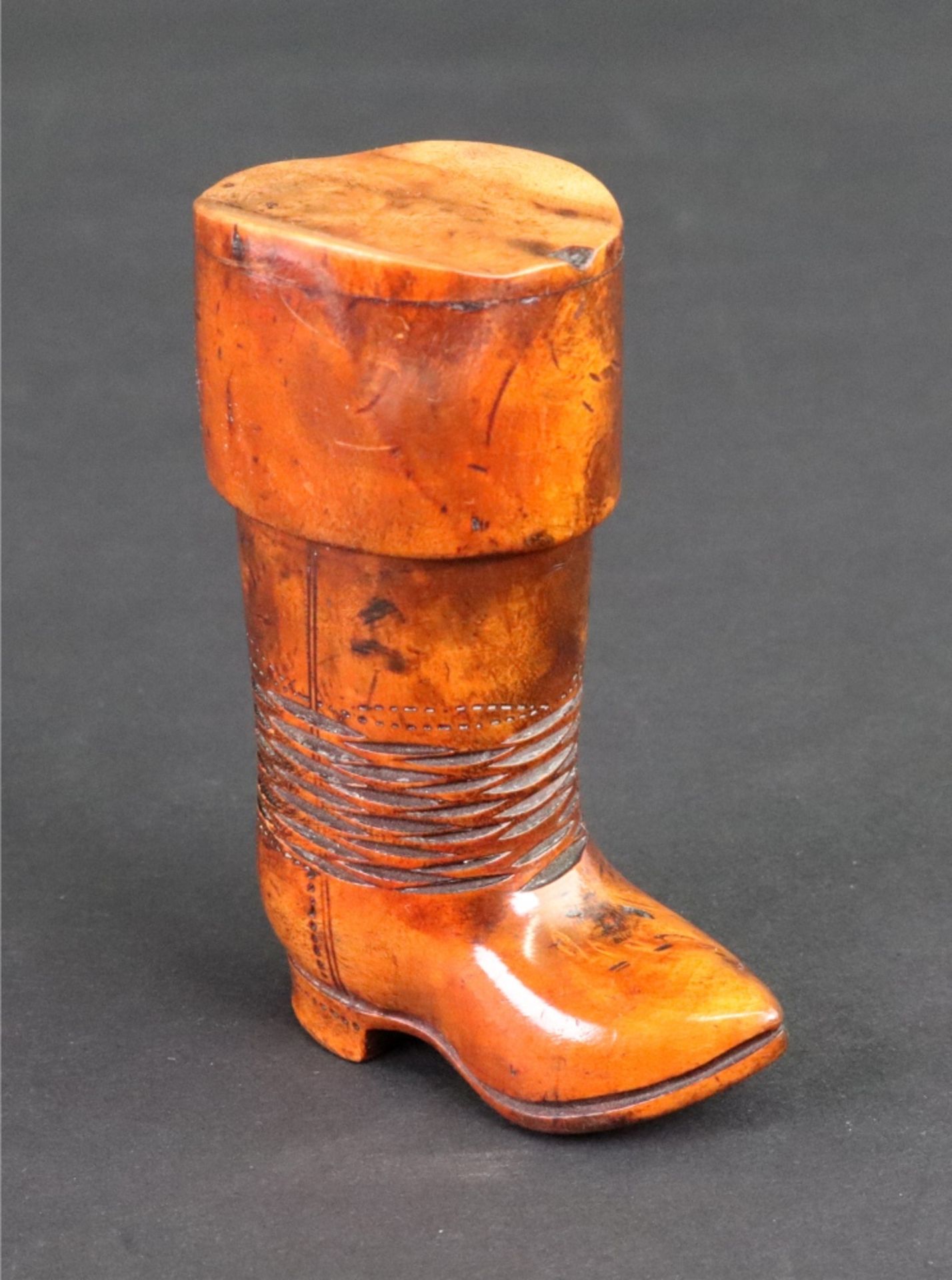 An unusual Victorian carved wood snuff box, in the form of a boot,