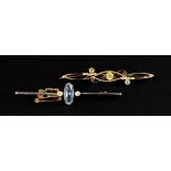 Two early 20th century gold and gem brooches, comprising; a platinum-flashed gold bar brooch,