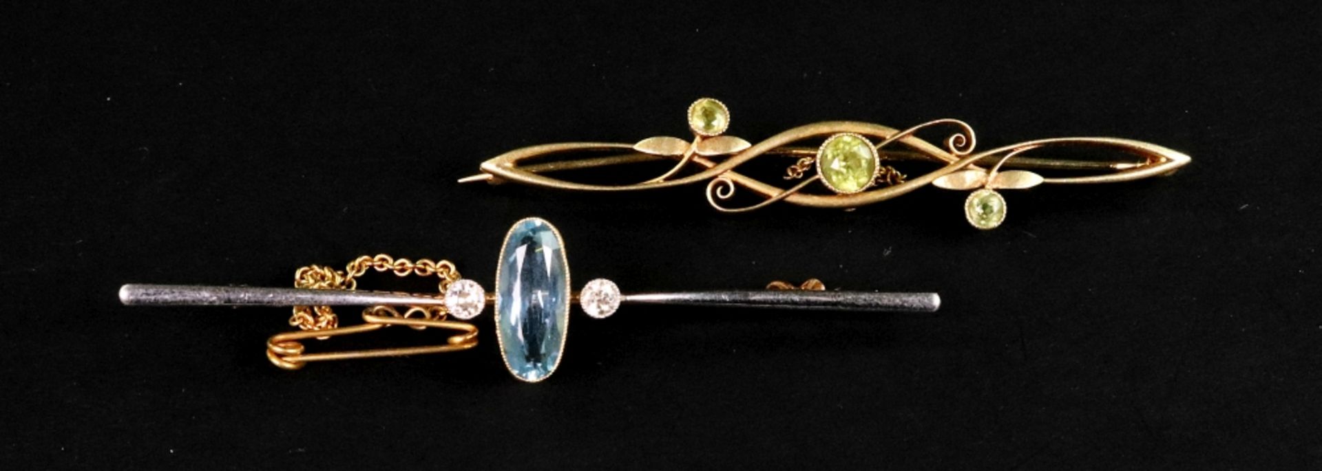 Two early 20th century gold and gem brooches, comprising; a platinum-flashed gold bar brooch,