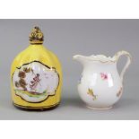 A small Meissen baluster shape cream jug, painted with scattered flowers, 7.