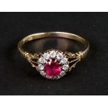 An early 20th century gold, ruby and diamond cluster ring,