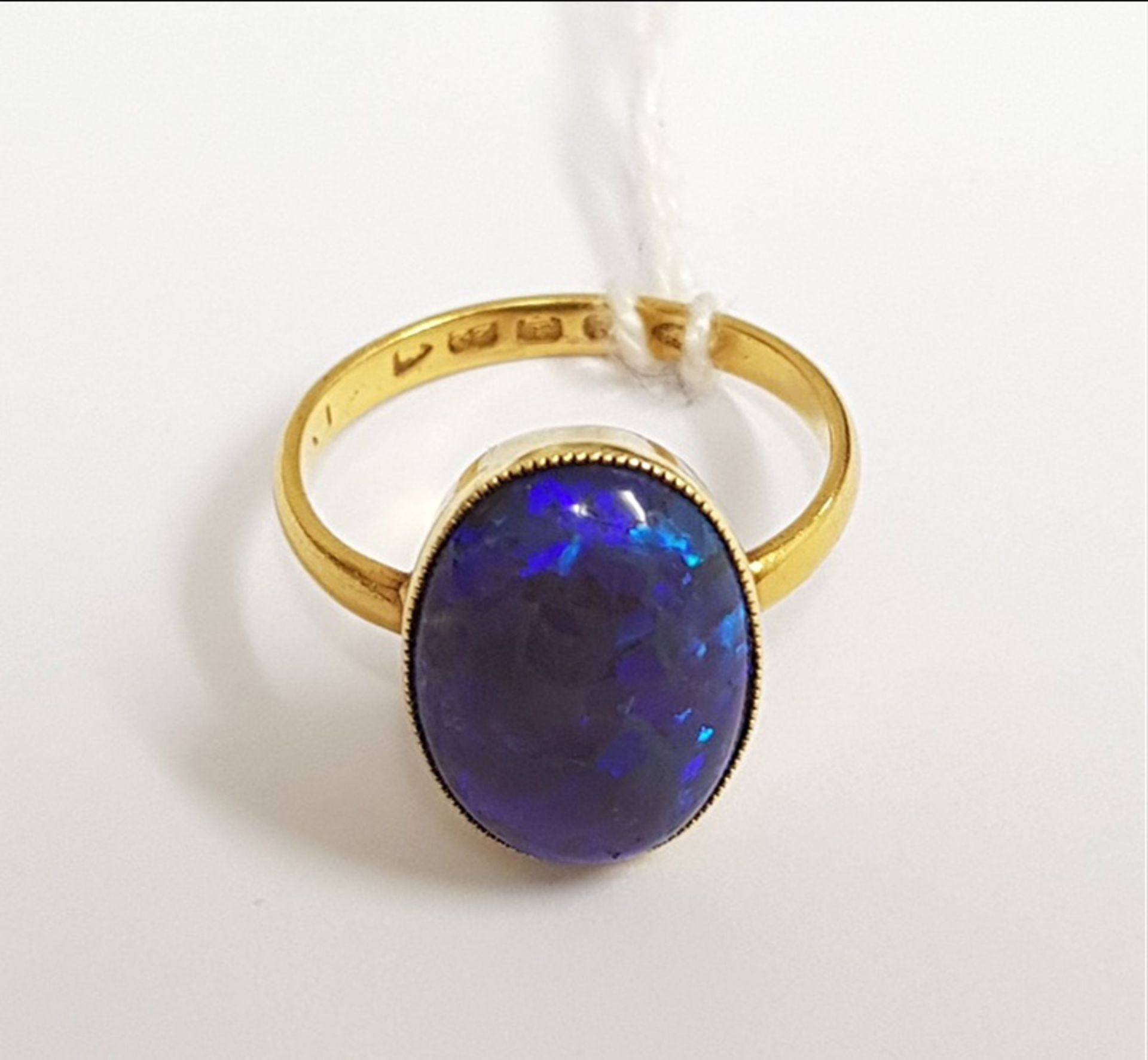A late Victorian gold and black opal single stone ring, the oval cabochon approx. - Image 3 of 4