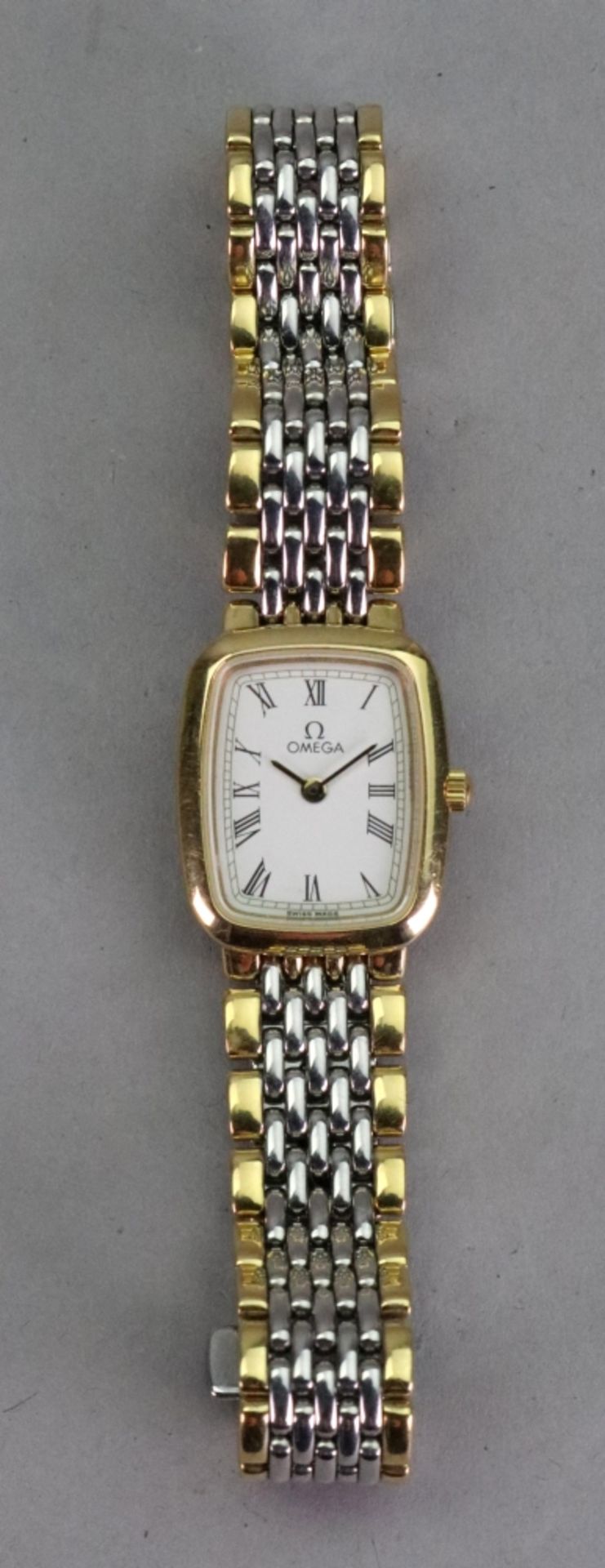 Omega; a lady's DeVille stainless steel and yellow metal wristwatch, the dial signed 'Omega',