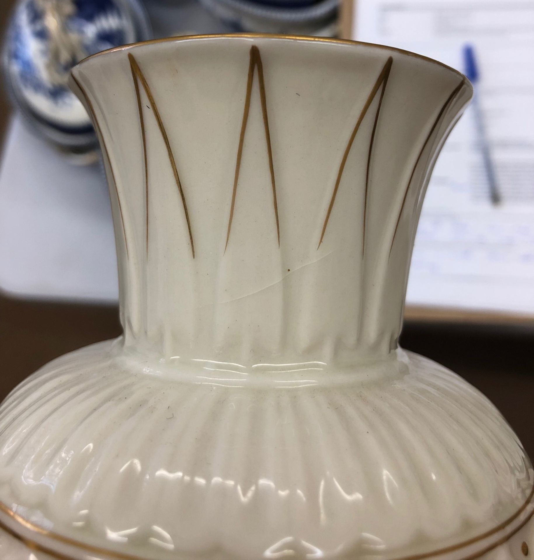 A Belleek cream glazed amphora, heightened with gilding, - Image 6 of 8