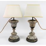 A pair of Victorian grey variegated alabaster urns, later adapted as table lamps,