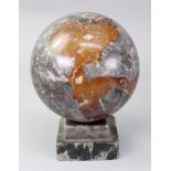 A grey veined marble sphere, 19th century, on stepped square plinth base, 12cm diameter, 17cm high.