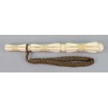 An ivory parasol handle, second half 19th century, carved and pierced in three rope bound sections,