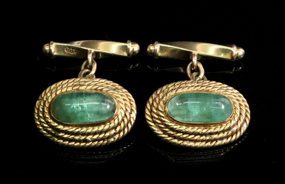 A pair of oval cuff links, circa 1960's,