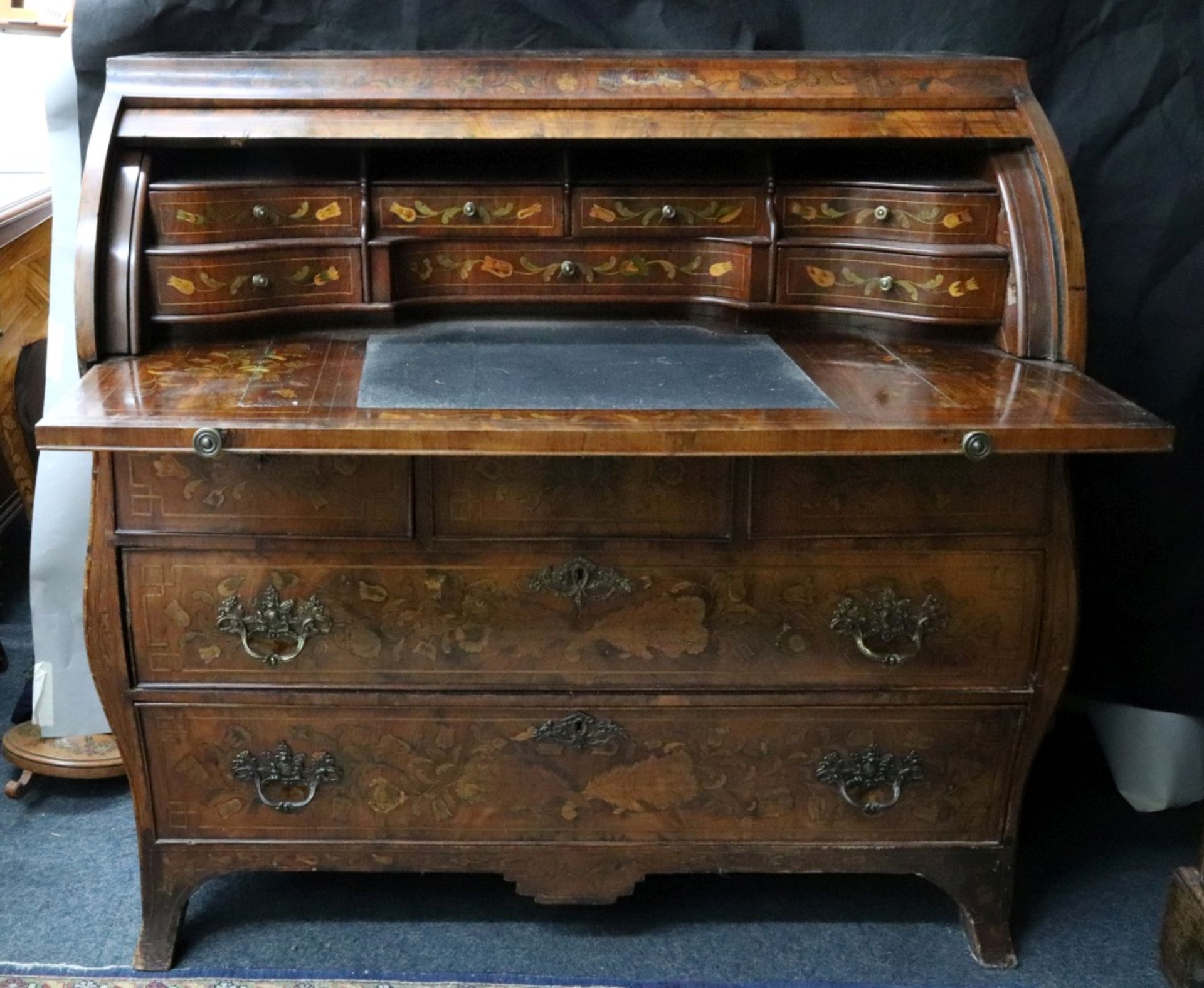 A Dutch walnut floral and bird marquetry cylinder front bombe bureau, late 18th century,