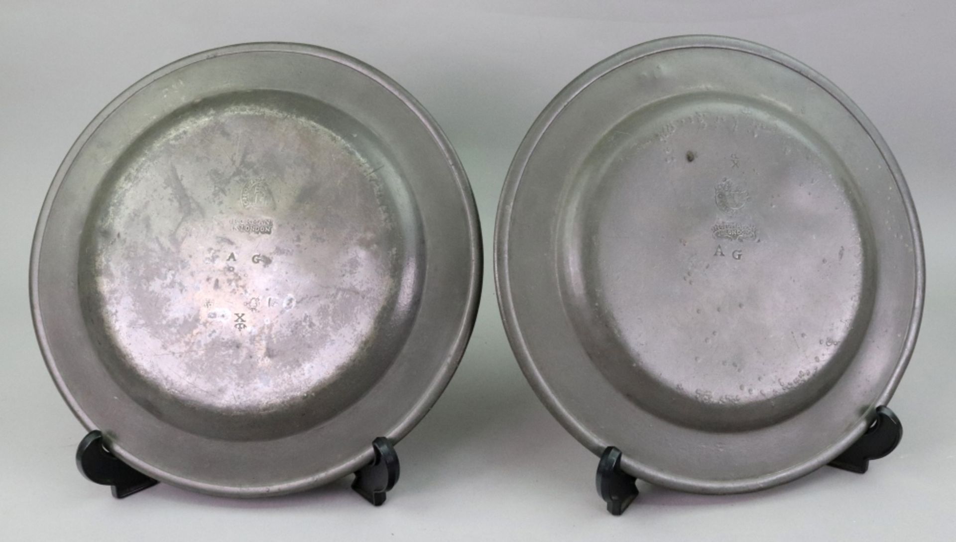 A set of three English pewter dinner plates, 18th century, touch marks of John Tidmarsh, London, 23. - Image 2 of 3