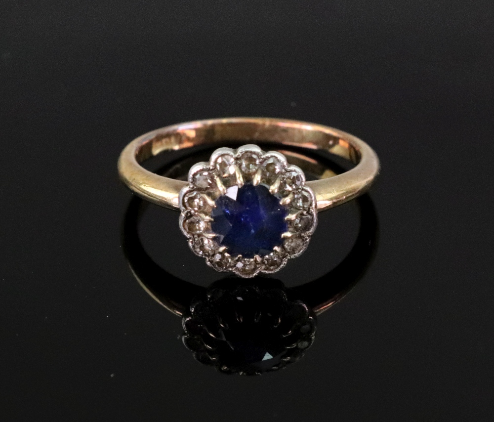 A sapphire and diamond cluster ring,