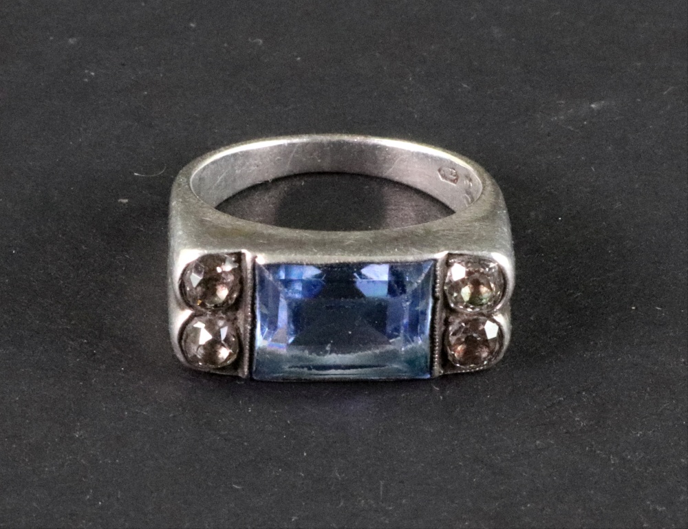 A white gold, blue topaz and diamond ring, the rectangular step cut topaz in millegrain setting, - Image 2 of 3