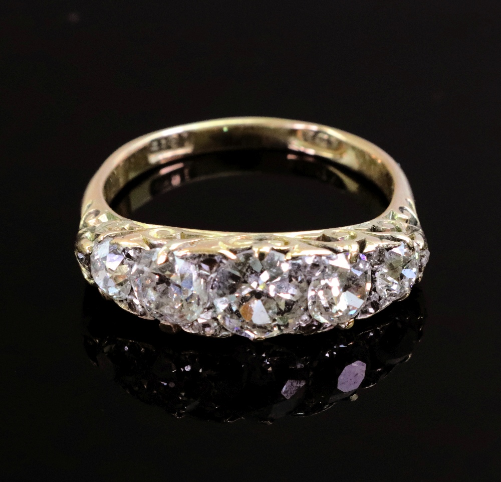 A late Victorian gold and diamond five stone carved half-hoop ring with rose diamond points, - Image 2 of 3