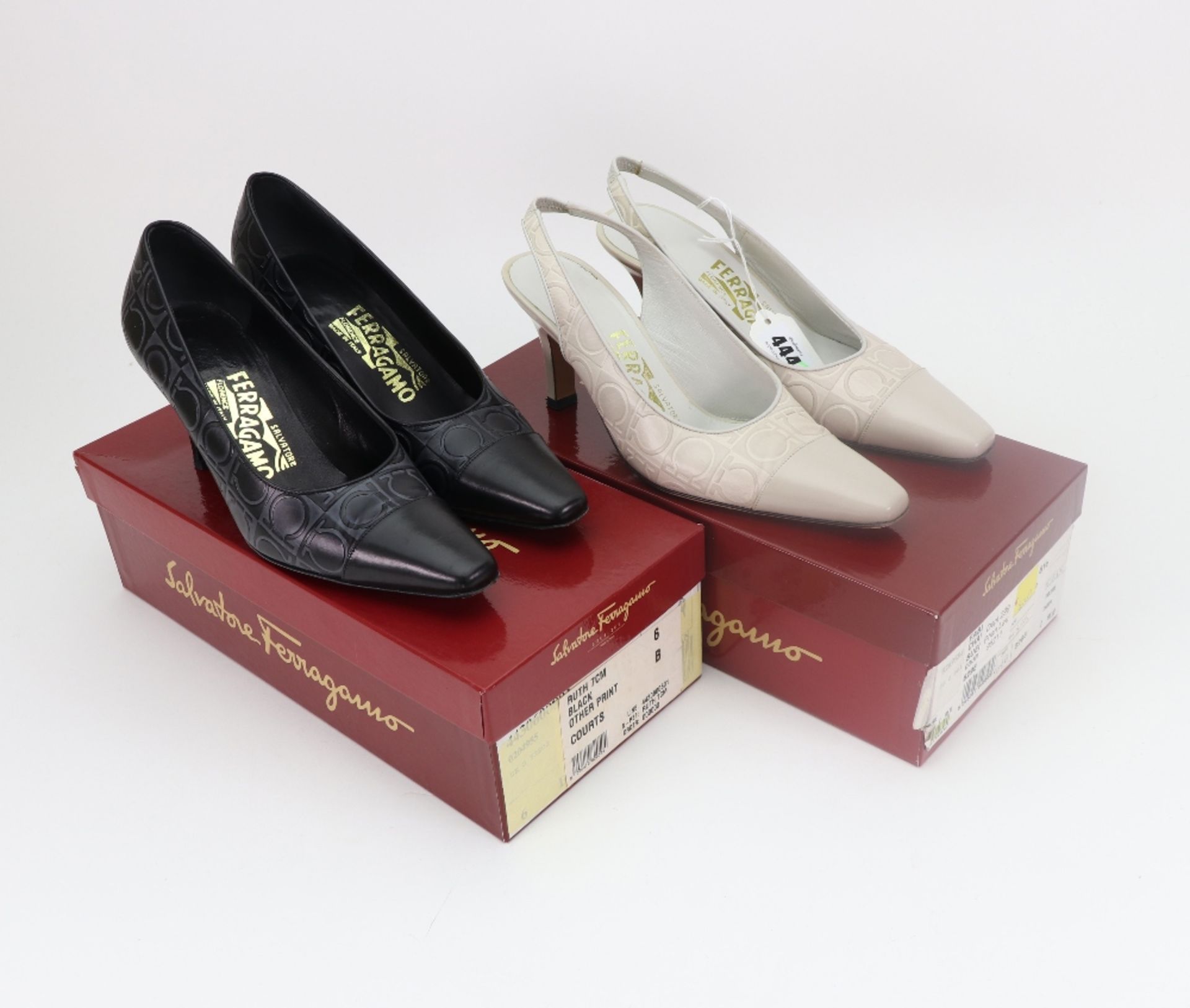 A Pair of black Ferragamo shoes, size 4 approx and a pair of cream slingback shoes,