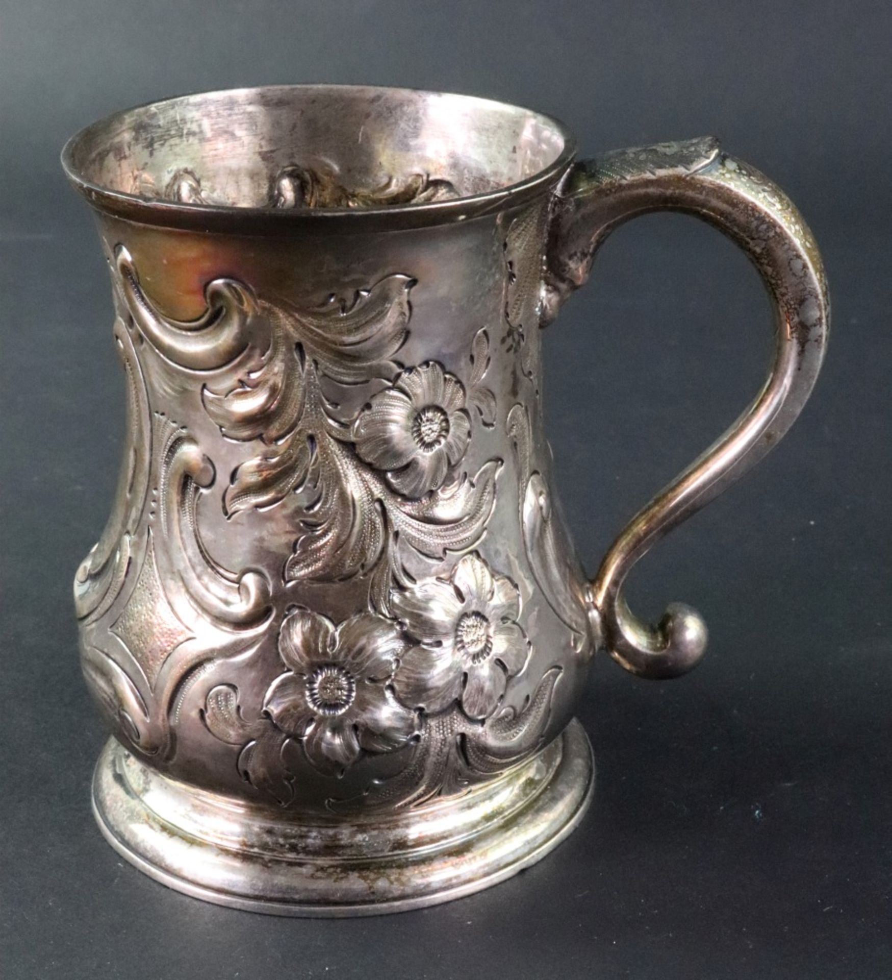 A George II silver baluster shape mug, London 1729, makers mark unclear,