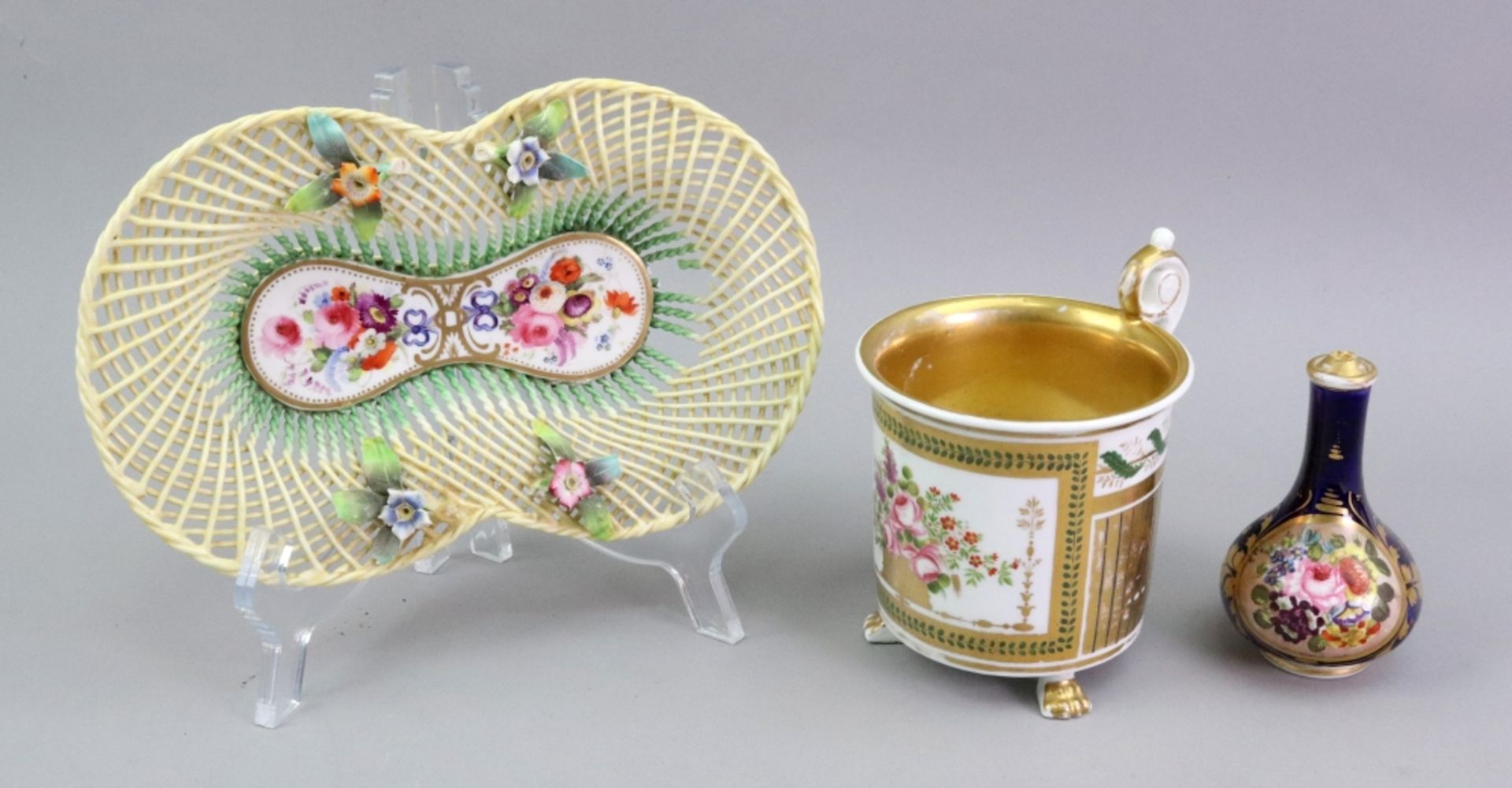 An English porcelain shaped oval basket, circa 1820,