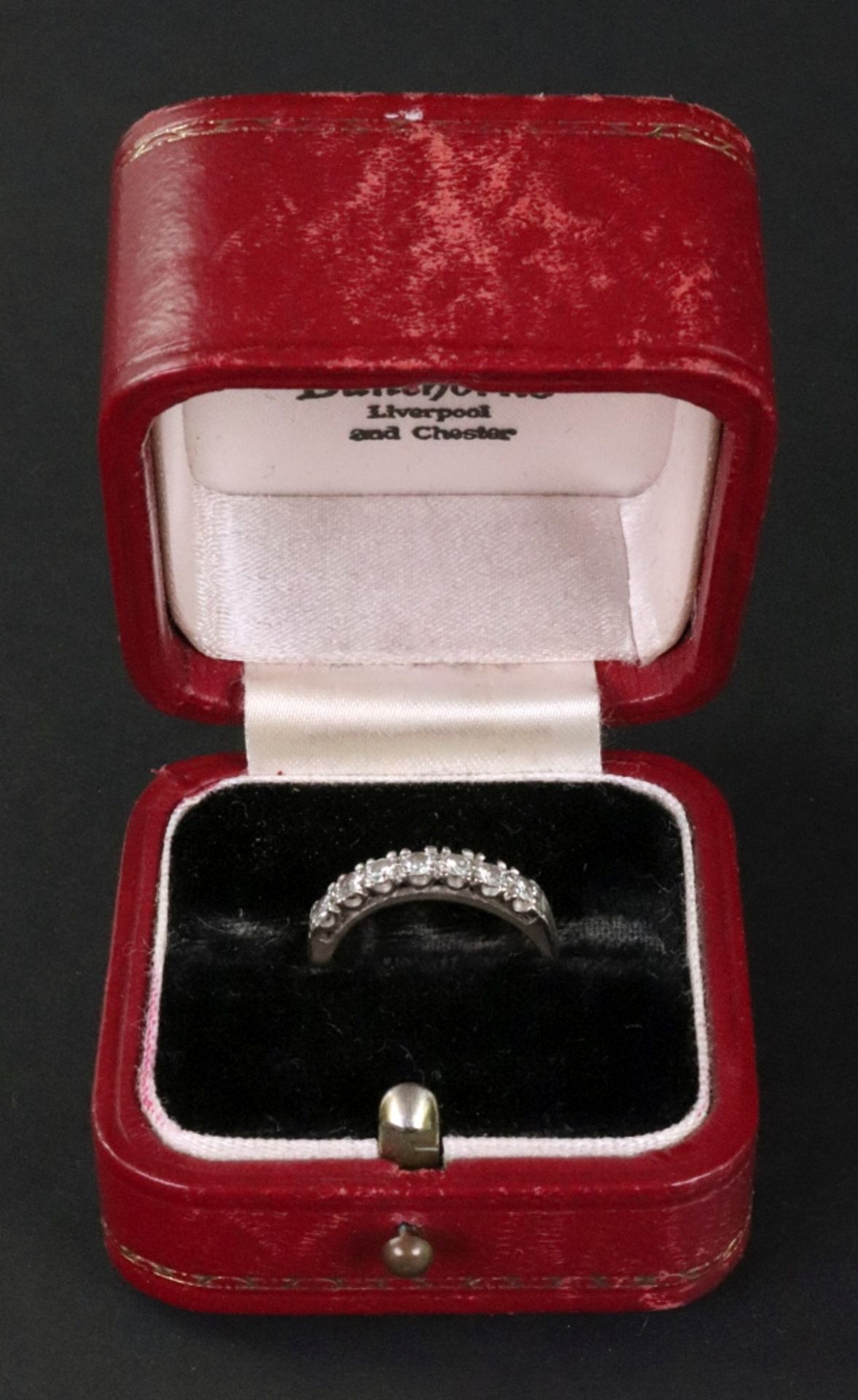 A Boodle and Dunthorne diamond half-eternity ring, the seven round brilliants approximately 0. - Bild 2 aus 2