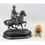 A Victorian bronzed speltar figure of a cavalry officer on horseback,