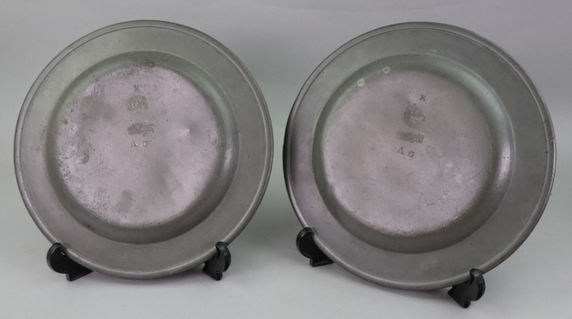 A set of three English pewter dinner plates, 18th century, touch marks of John Tidmarsh, London, 23. - Image 3 of 3