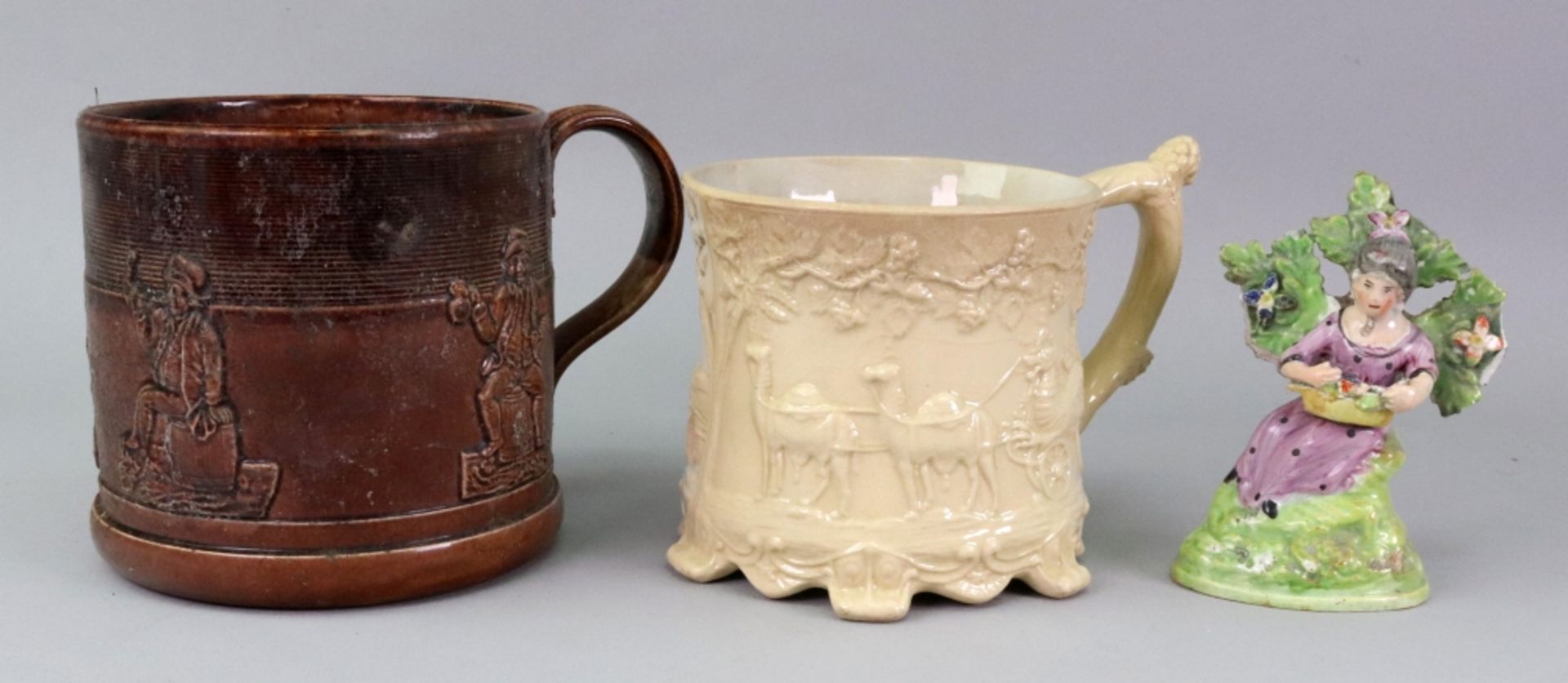 An unusual Staffordshire earthenware mug, 19th century,