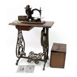 A Willcox & Gibbs 'Automatic' silent sewing machine, with mahogany platform base,