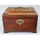 A George III rectangular mahogany tea caddy, the moulded hinged top enclosing three divisions,