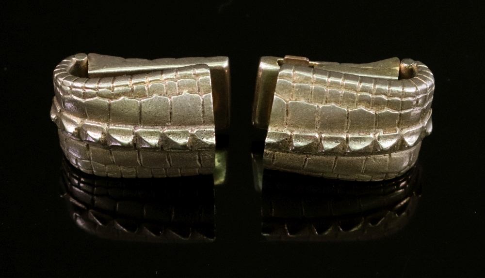 A pair of 9ct gold cufflinks, Asprey, London 1968, simulating crocodile, 18.6gms, 2cm wide.