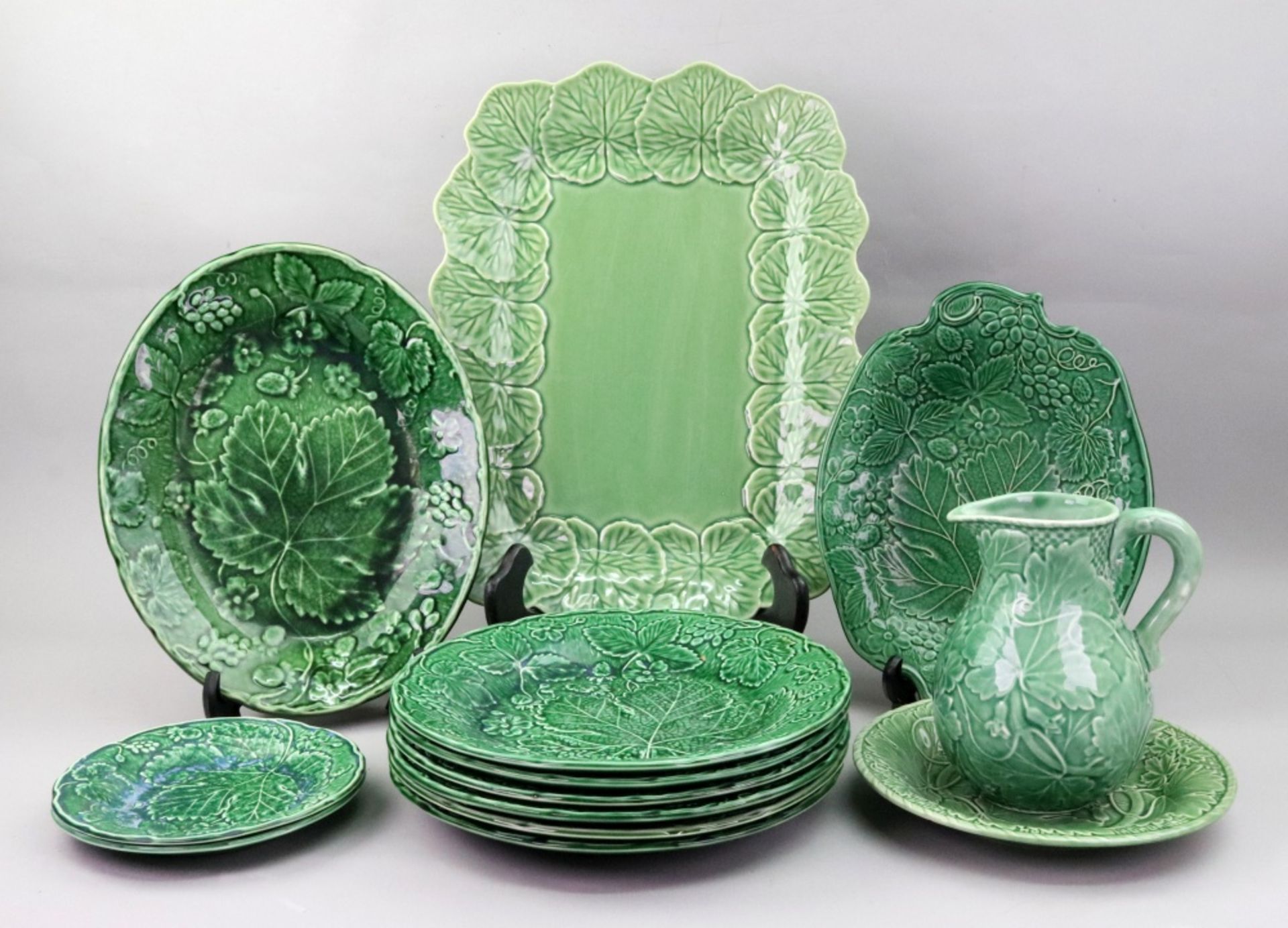 A set of six Burleigh green glazed cabbage leaf moulded dinner plates after Davenport originals,