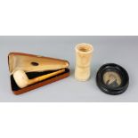 A Meerschaum pipe with amber mouthpiece, 14.5cm long, in a fitted case labelled Wm.