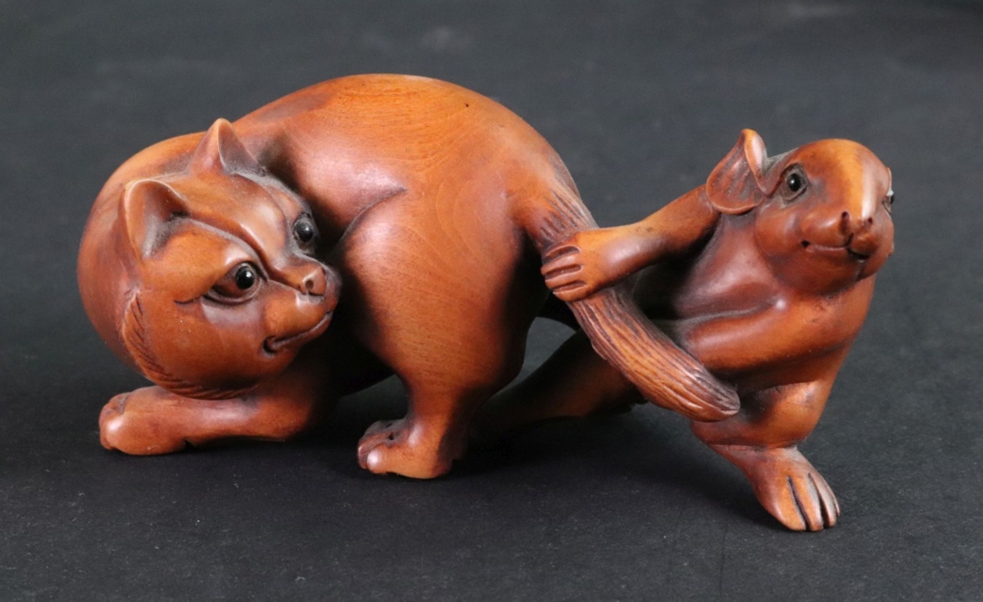 A collection of seven Japanese carved wood netsuke, 20th century, to include a frog on a tortoise, - Bild 4 aus 11