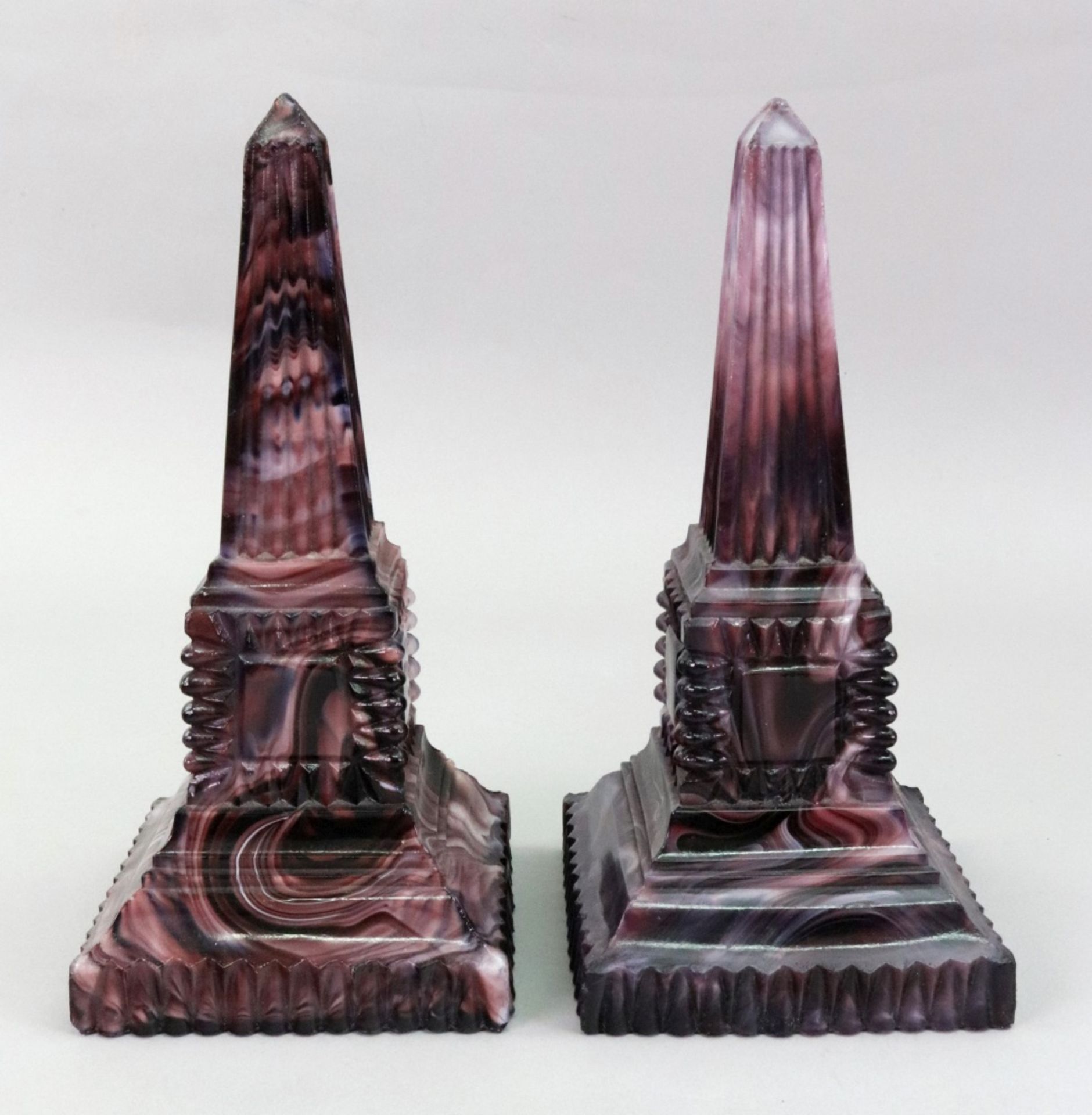 A pair of Victorian slag glass faux marble obelisks, 20cm high.