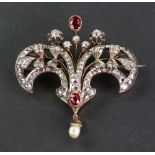 A late Victorian gold, synthetic-ruby and diamond floral double-scroll brooch,