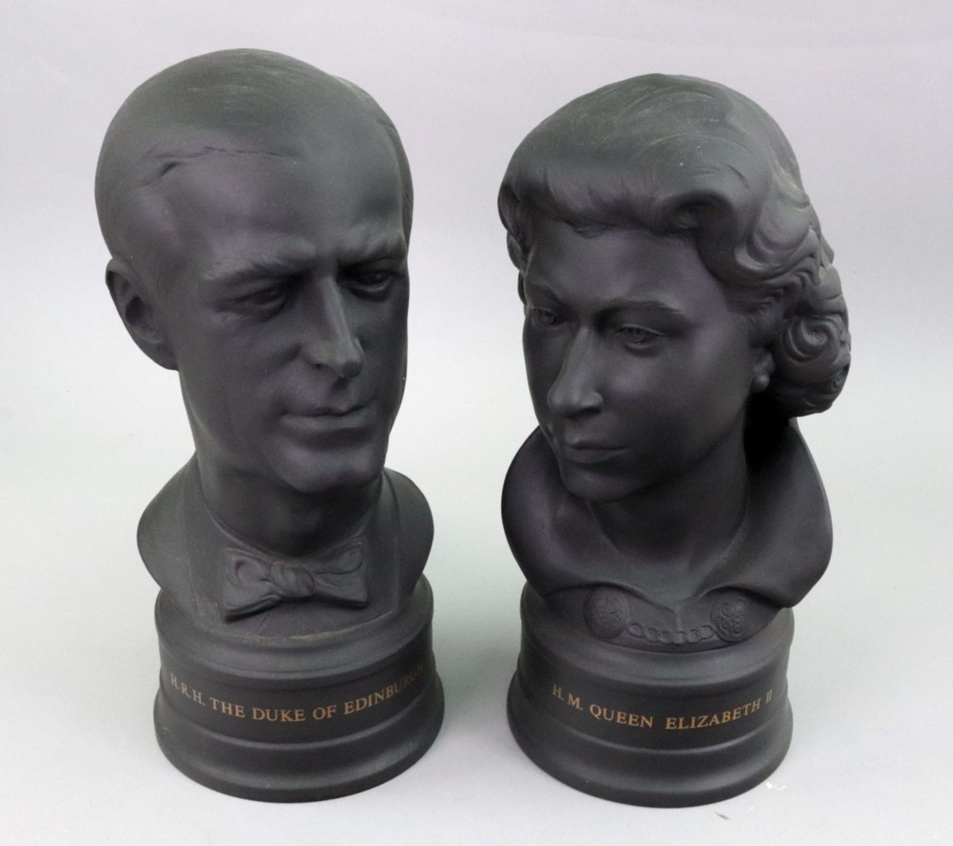 A pair of Wedgwood black basalt busts of H M Queen Elizabeth II and HRH The Duke of Edinburgh K.G.