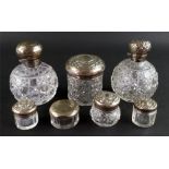 Two silver mounted spherical cut glass p