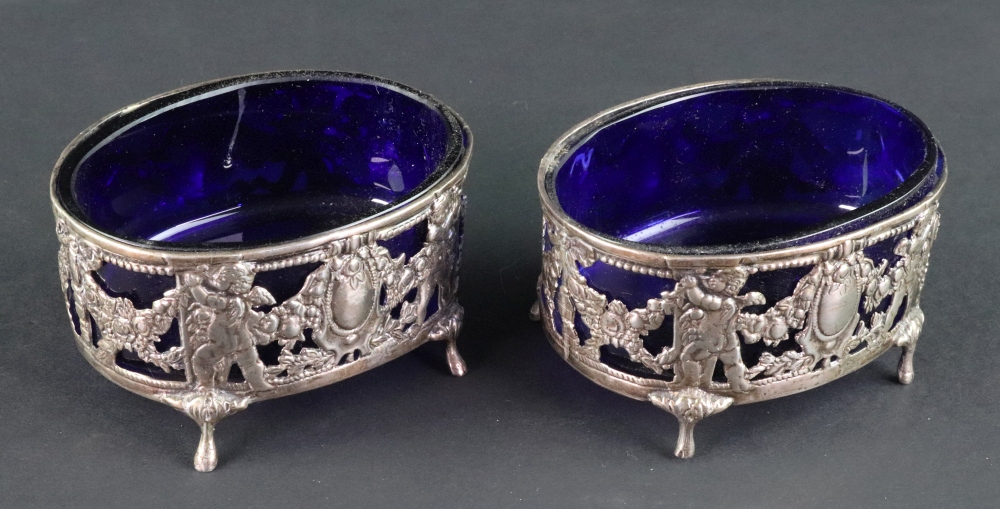 A pair of Dutch oval silver salt cellars