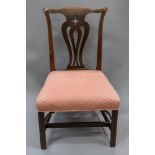 A George III Chippendale style mahogany dining chair, with undulating top rail,