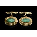 A pair of oval cuff links, circa 1960's,