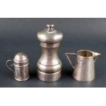 A silver capstan shape pepper mill, Lond