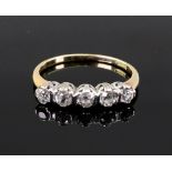 A five stone diamond ring, the claw set