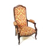 A 20th century French stained beech highback open armchair.