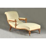 A 19th century French walnut framed open arm reclining chaise longue, on turned supports,