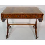 A Regency style mahogany sofa table on four downswept supports, 93cm wide x 73cm high.