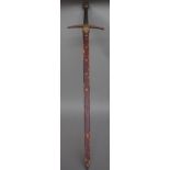 A 20th century ceremonial broad sword with double edged steel blade, 91cm, cross guard hilt,