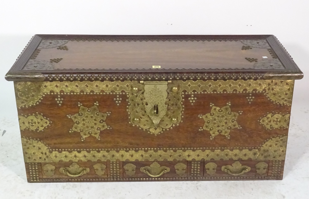 A 20th century African hardwood and brass bound studded trunk with three drawers, - Image 2 of 2